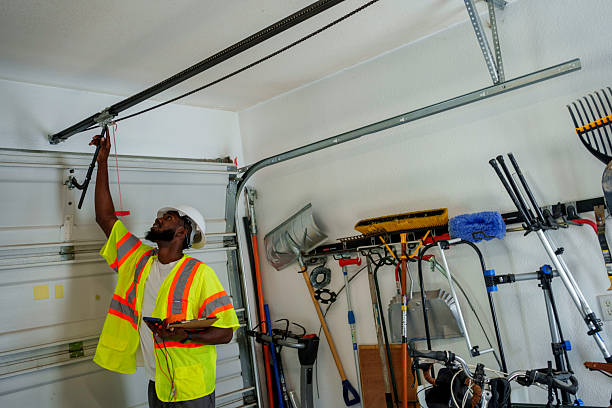 Professional Garage Door Roller Replacement technician working in South Portland, ME